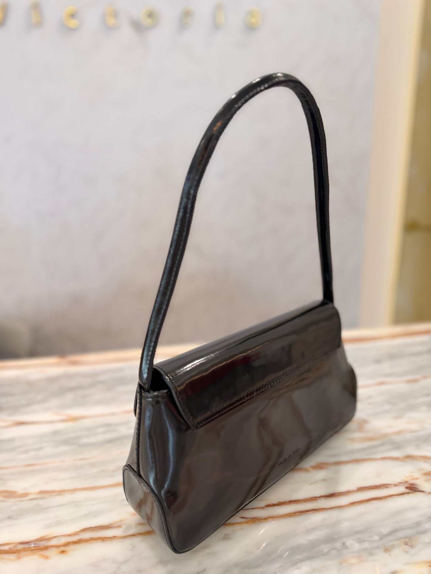 Patent shoulder bag
