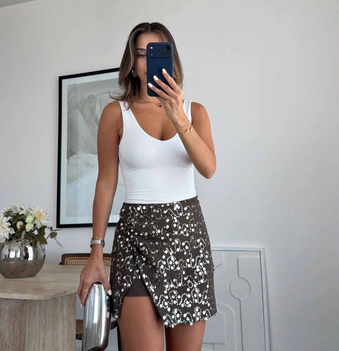 Eyelet mini skirt