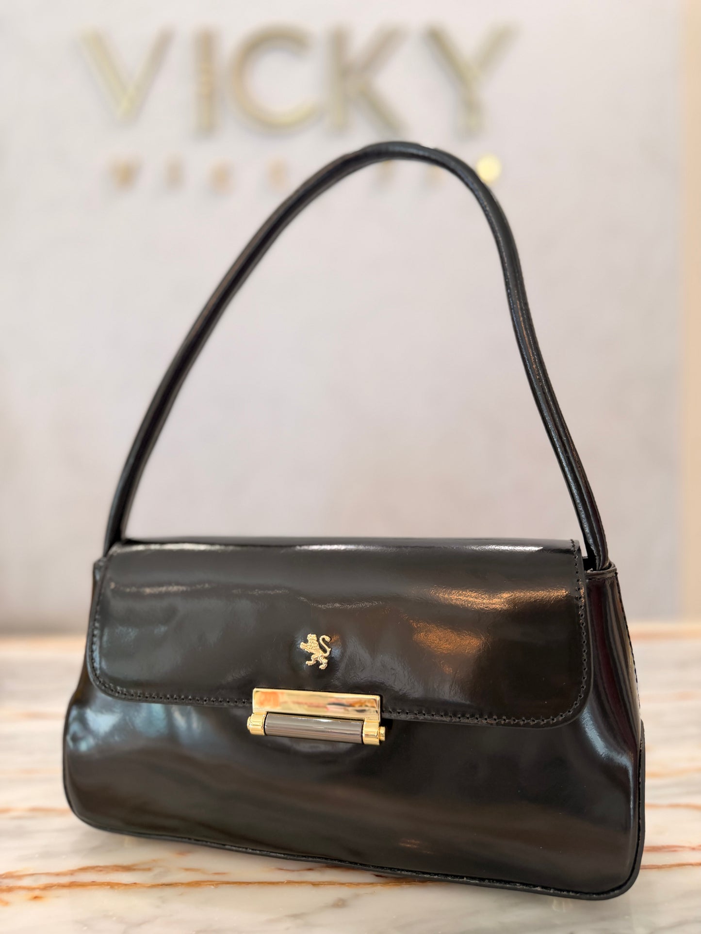 Patent shoulder bag